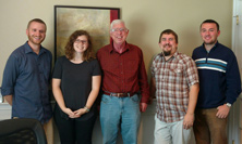 Garth with Parma. Pictured: Chris Robinson, Samantha Granville, Garth Baxter, Brett Picknell and Patrick Niland.